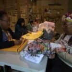 Mama Carla Wiley leads free fiber arts workshops at Stenton