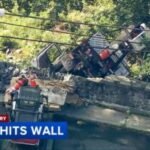 Driver struck by trailer while jumping from vehicle before truck falls off Wilmington bridge