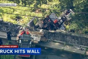 Driver struck by trailer while jumping from vehicle before truck falls off Wilmington bridge