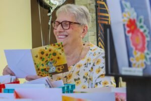 Cancer survivor crafts her own cards for AtlantiCare patients & staff