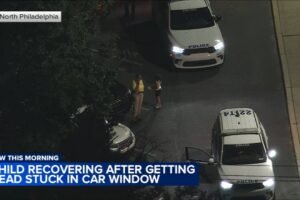 Philadelphia police help free child with head stuck in car window