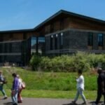 Hampshire College has secured a loan to offer classes through the fall semester, school says