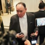 Philippines protests China's sanctions against its defense chief as 'an unfriendly act'