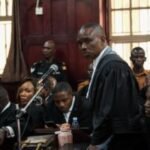 Uganda court charges lawyer for jailed Ugandan opposition leader with concealing treason