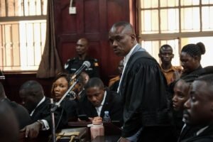 Uganda court charges lawyer for jailed Ugandan opposition leader with concealing treason