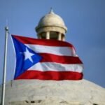 Puerto Rico roiled by widening political crisis as top official comes under fire