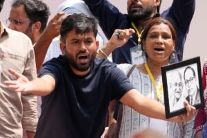 India's Cockroach Party supporters bang plates to call for education minister's resignation