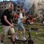In one of Kyiv's most frequently bombed neighborhoods, residents choose to stay