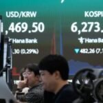 Asian shares slip and South Korea’s Kospi index sinks 11% on heavy selling of chipmaking stocks