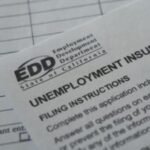 US filings for jobless benefits rise to 197,000 last week, but layoffs remain historically low