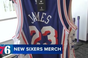 Fans line up for chance to buy LeBron James 76ers jerseys at special team store opening