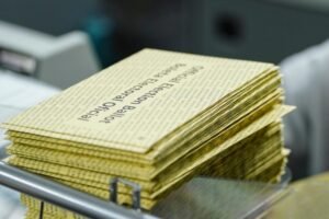 Judge removes one hurdle for Trump mail voting order as states file new challenge before midterms