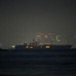 USS Abraham Lincoln sails past Singapore on its way home from Middle East