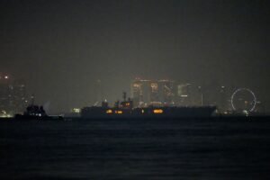 USS Abraham Lincoln sails past Singapore on its way home from Middle East