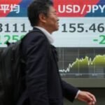 Asian stocks are mixed as yen jumps against the dollar, while oil prices slip