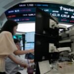 Asian shares are mixed after US stocks fall back while oil rebounds