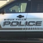 Early morning car robbery leaves woman with minor injuries
