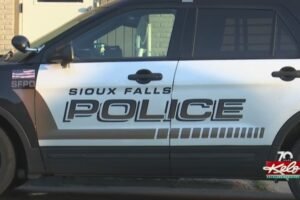 Early morning car robbery leaves woman with minor injuries